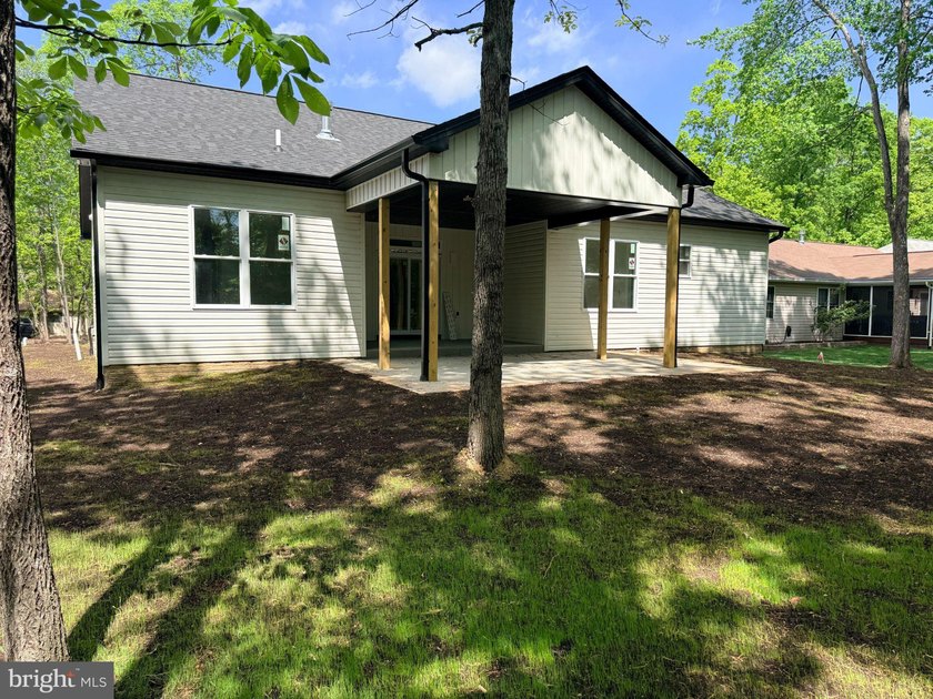 Nestled in the prestigious Lake of the Woods community, this - photo 6