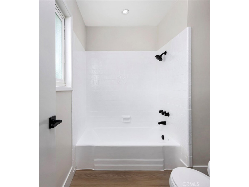 Beautifully refreshed and move-in ready, this 4-bedroom - photo 11