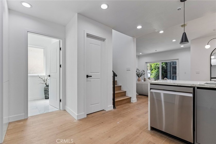 NEW CONSTRUCTION 3 bed, 2.5 bath, three-story townhome with sky - photo 13