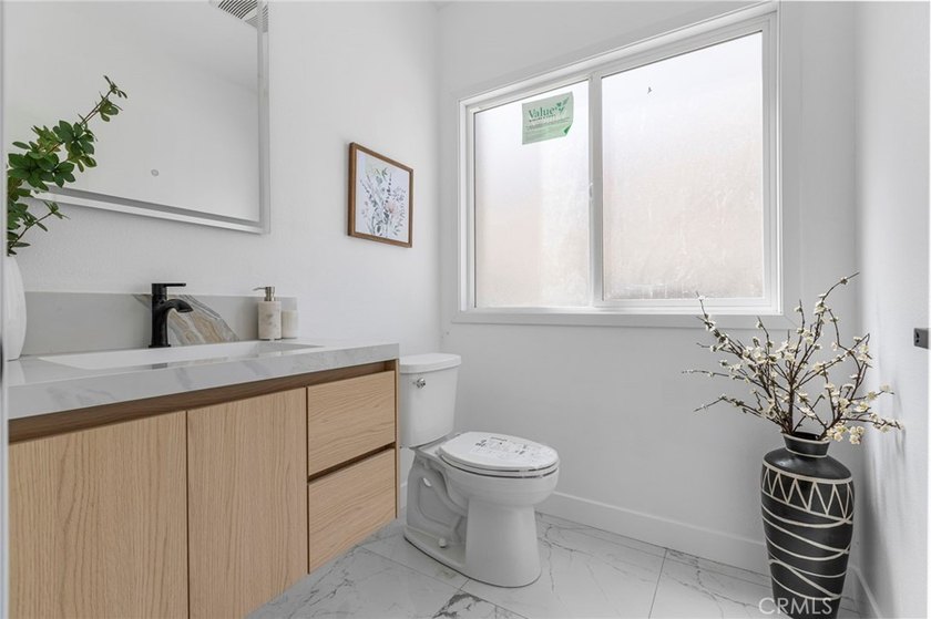 NEW CONSTRUCTION 3 bed, 2.5 bath, three-story townhome with sky - photo 14
