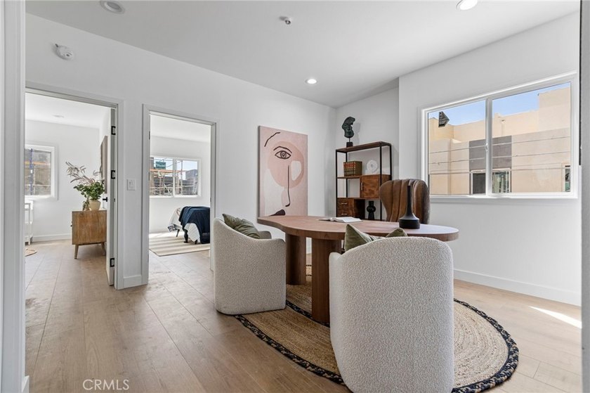 NEW CONSTRUCTION 3 bed, 2.5 bath, three-story townhome with sky - photo 15
