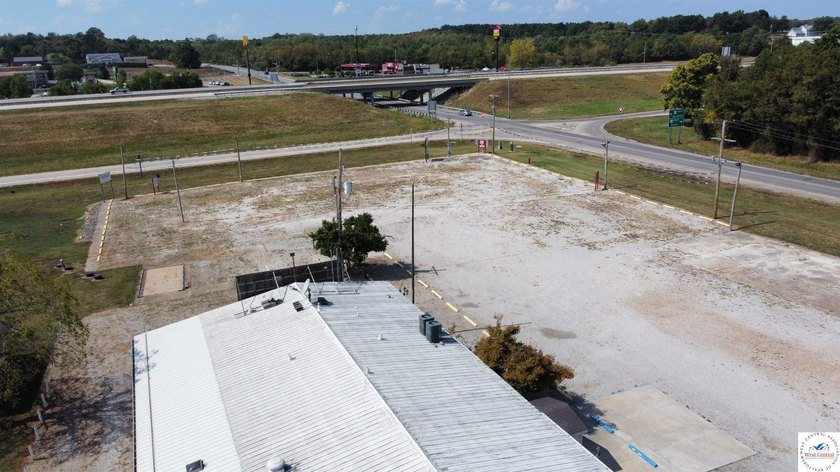 Commercial building and large tract located at the corner of 65 - photo 19