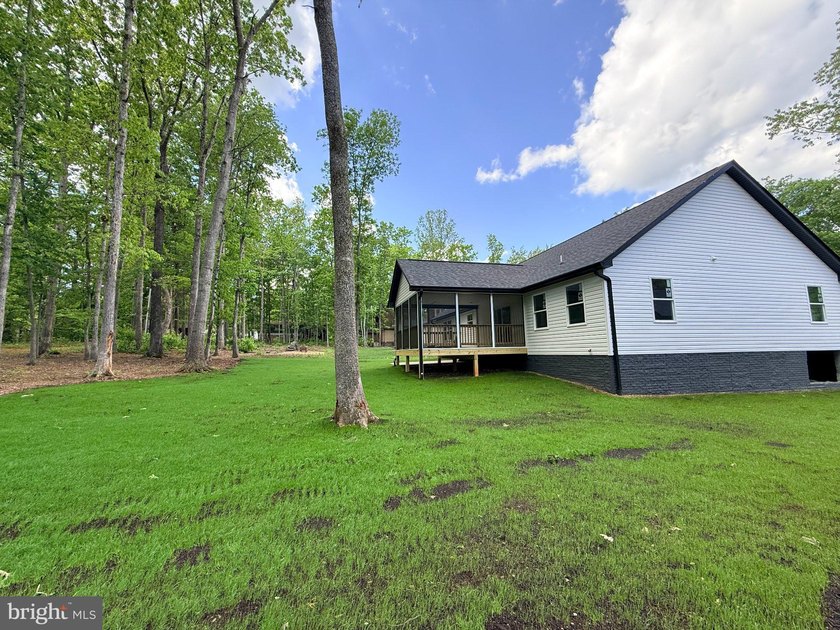 Nestled in the prestigious Lake of the Woods community, this - photo 6