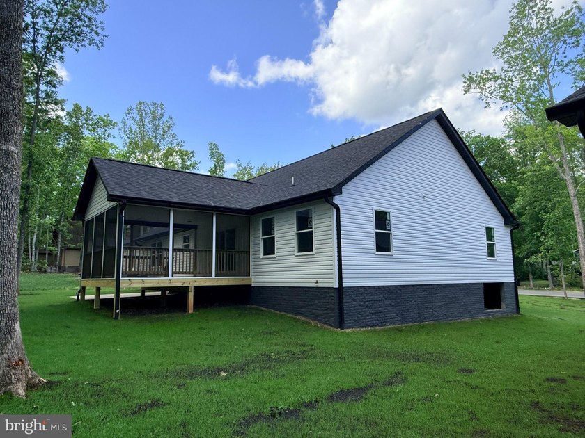 Nestled in the prestigious Lake of the Woods community, this - photo 7