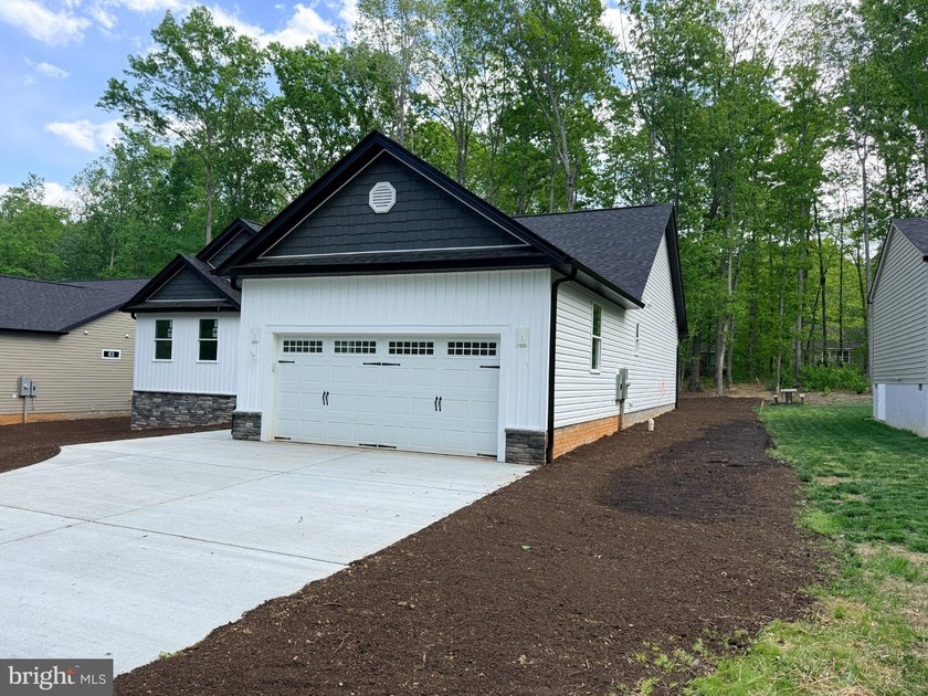 Nestled in the prestigious Lake of the Woods community, this - photo 9