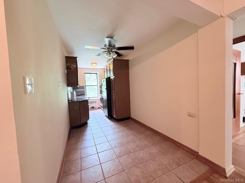 Welcome to this bright and inviting two-bedroom co-op apartment - photo 2