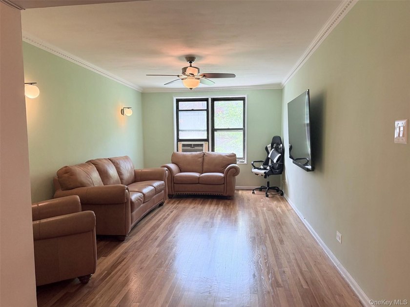 Welcome to this bright and inviting two-bedroom co-op apartment - photo 5