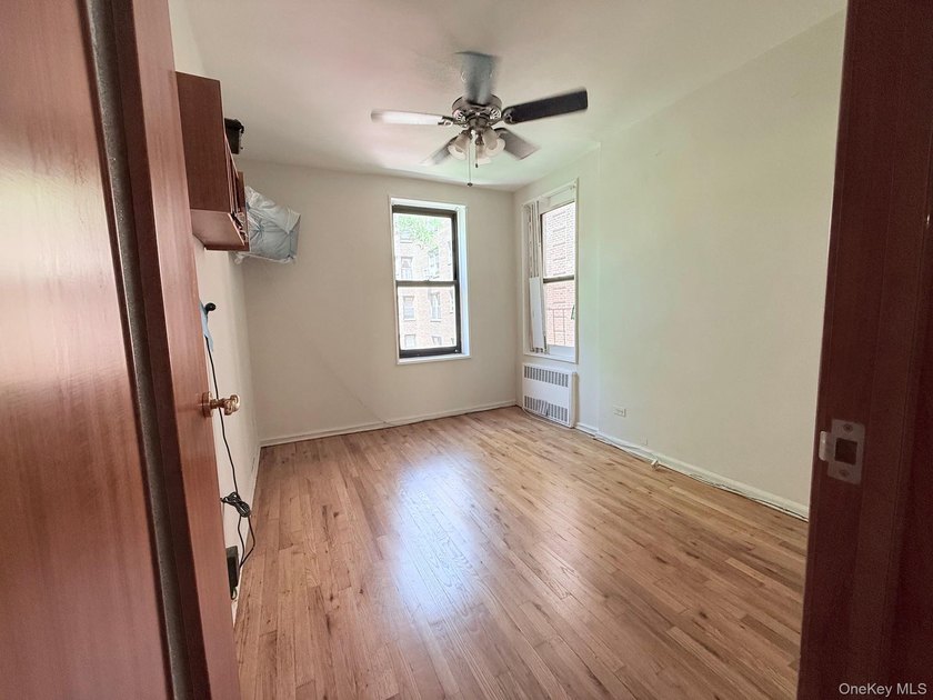 Welcome to this bright and inviting two-bedroom co-op apartment - photo 9