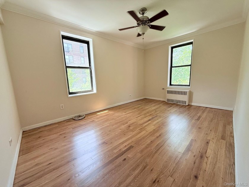 Welcome to this bright and inviting two-bedroom co-op apartment - photo 10
