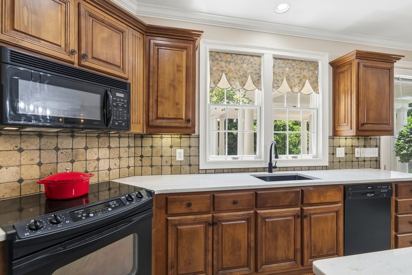 Nestled within the coveted Parkside enclave of Cuscowilla on - photo 29