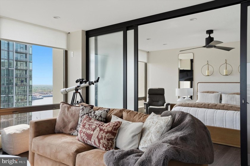 Perched high above the city in Society Hill Towers, this newly - photo 8