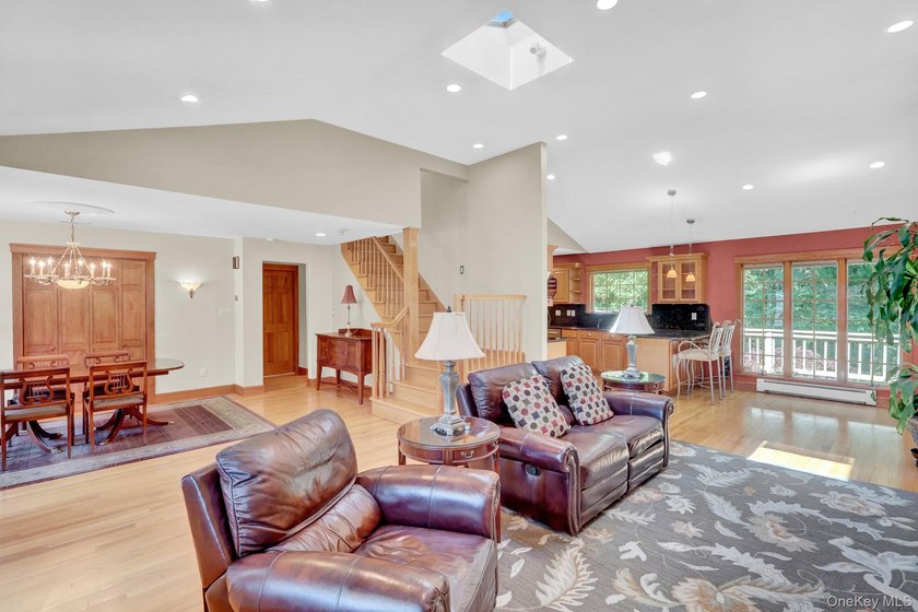 Welcome to this beautifully expanded ranch nestled in one of the - photo 7