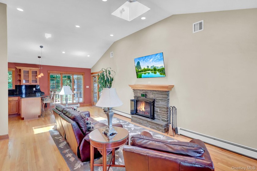 Welcome to this beautifully expanded ranch nestled in one of the - photo 8