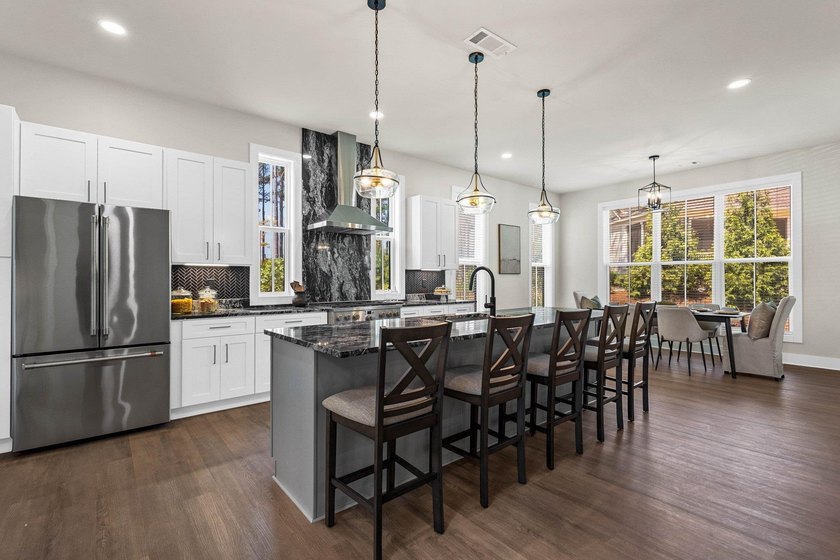 Nestled in the heart of Cuscowilla on Lake Oconee, this - photo 19