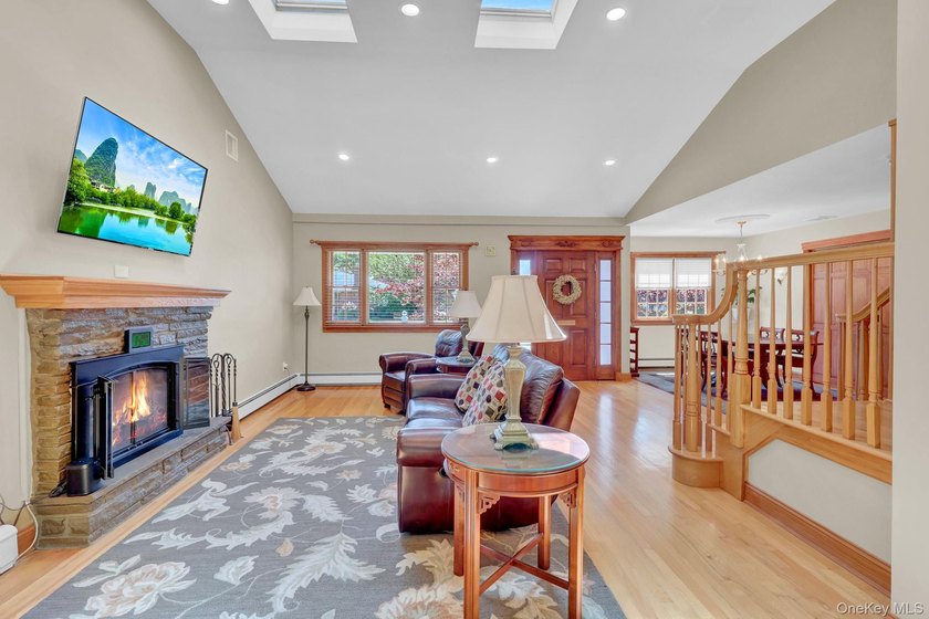 Welcome to this beautifully expanded ranch nestled in one of the - photo 9
