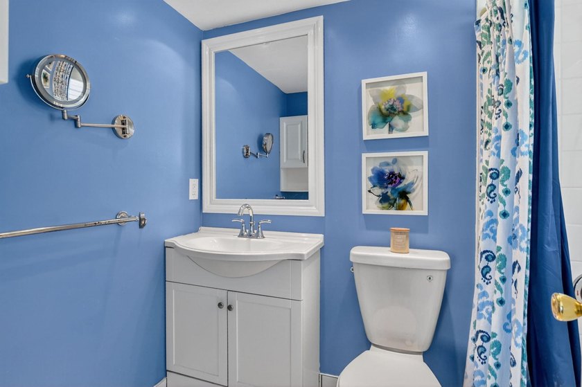 Bright and beautifully updated, this first-floor corner - photo 17