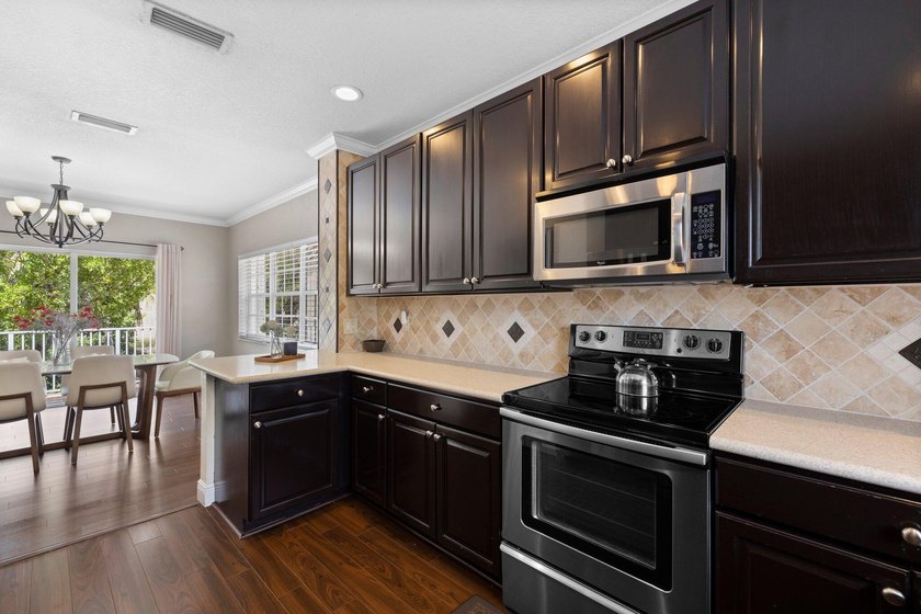 Welcome to Vizcaya at Lake Coral Springs, a gated, waterfront - photo 6