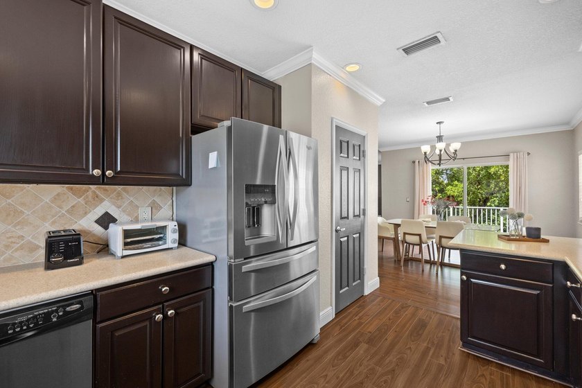Welcome to Vizcaya at Lake Coral Springs, a gated, waterfront - photo 8