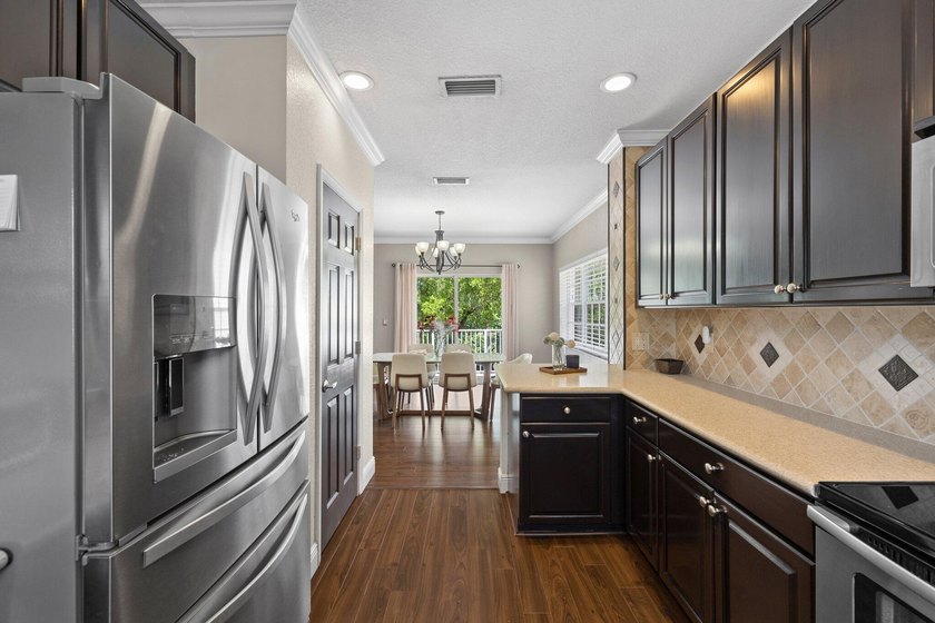 Welcome to Vizcaya at Lake Coral Springs, a gated, waterfront - photo 9