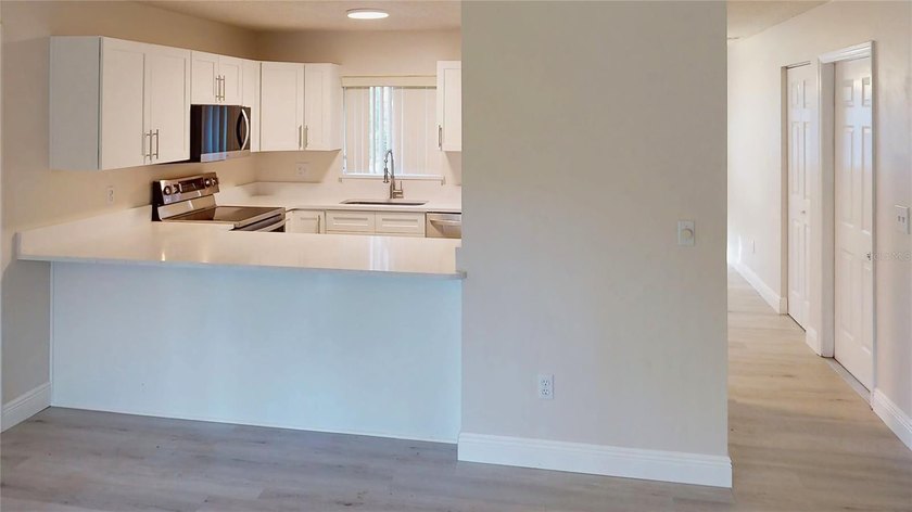 Beautifully Updated Pine Lakes Corner-Lot Home - Feels Like a - photo 8