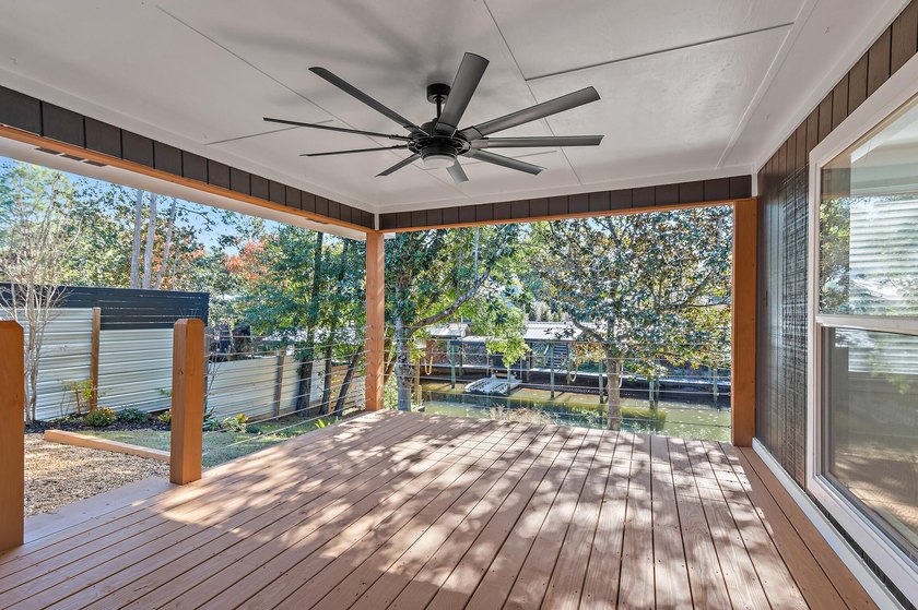 75' of canal frontage sets the stage for easy waterfront living - photo 16