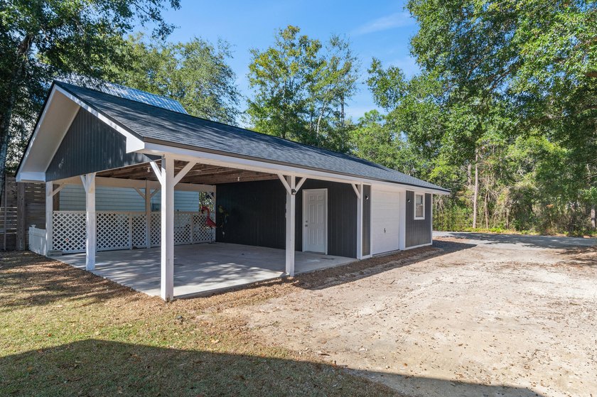 75' of canal frontage sets the stage for easy waterfront living - photo 35