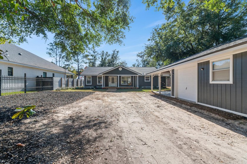 75' of canal frontage sets the stage for easy waterfront living - photo 38