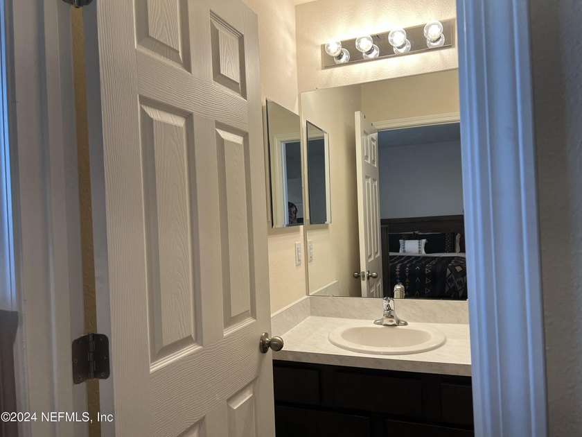 Located on a quiet cul-de-sac, this like-new construction offers - photo 11
