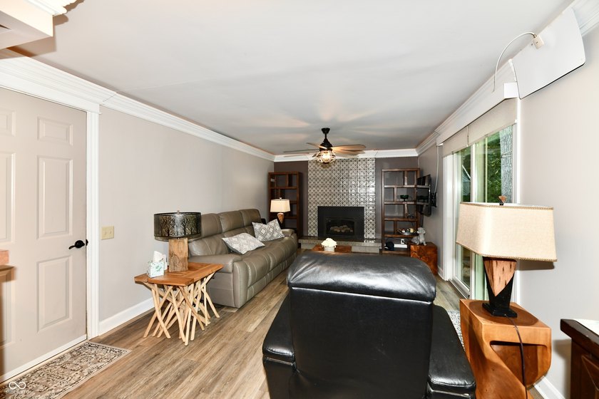Tucked away on a quiet lot that COMBINES a spacious lawn with a - photo 17