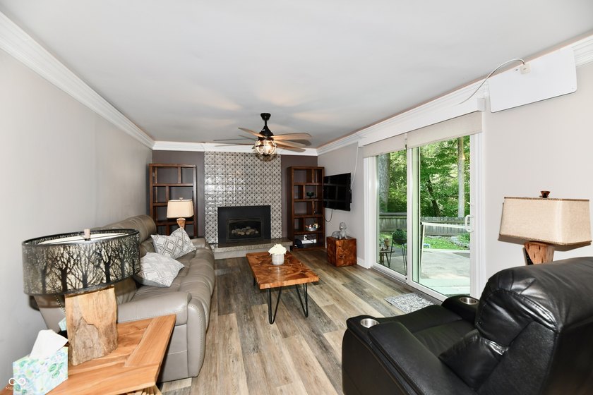 Tucked away on a quiet lot that COMBINES a spacious lawn with a - photo 18
