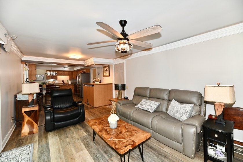 Tucked away on a quiet lot that COMBINES a spacious lawn with a - photo 21