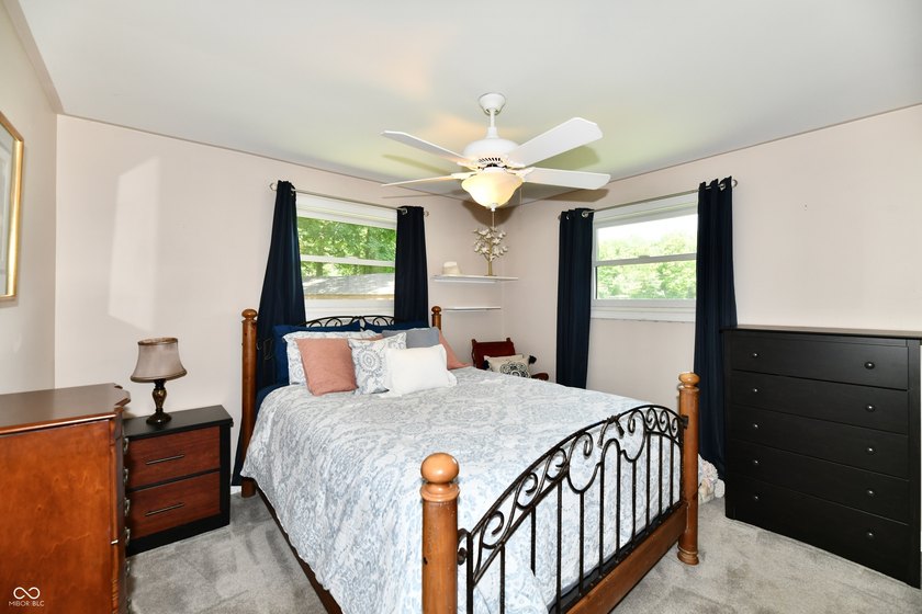 Tucked away on a quiet lot that COMBINES a spacious lawn with a - photo 31