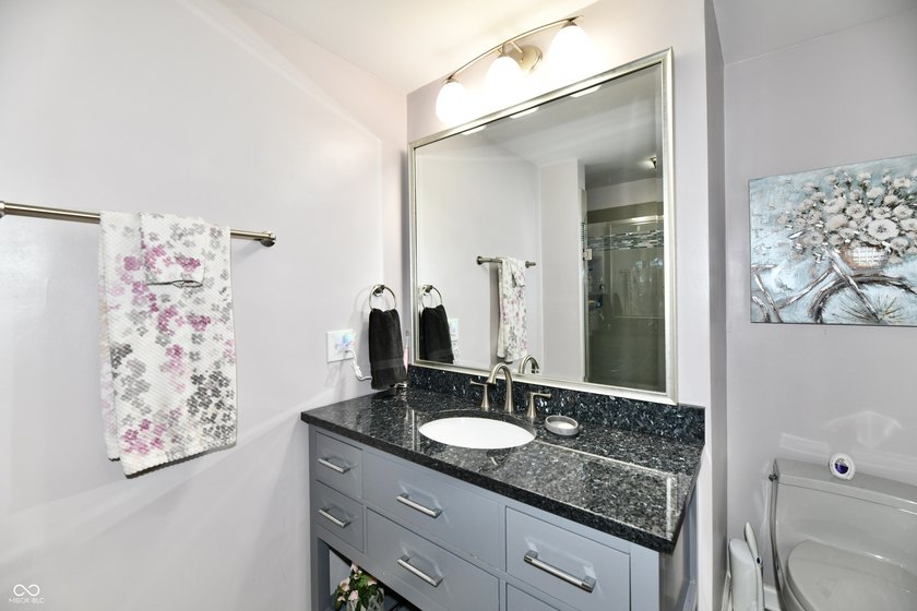 Tucked away on a quiet lot that COMBINES a spacious lawn with a - photo 35