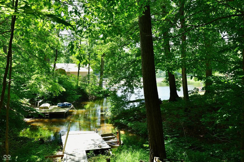 Tucked away on a quiet lot that COMBINES a spacious lawn with a - photo 42