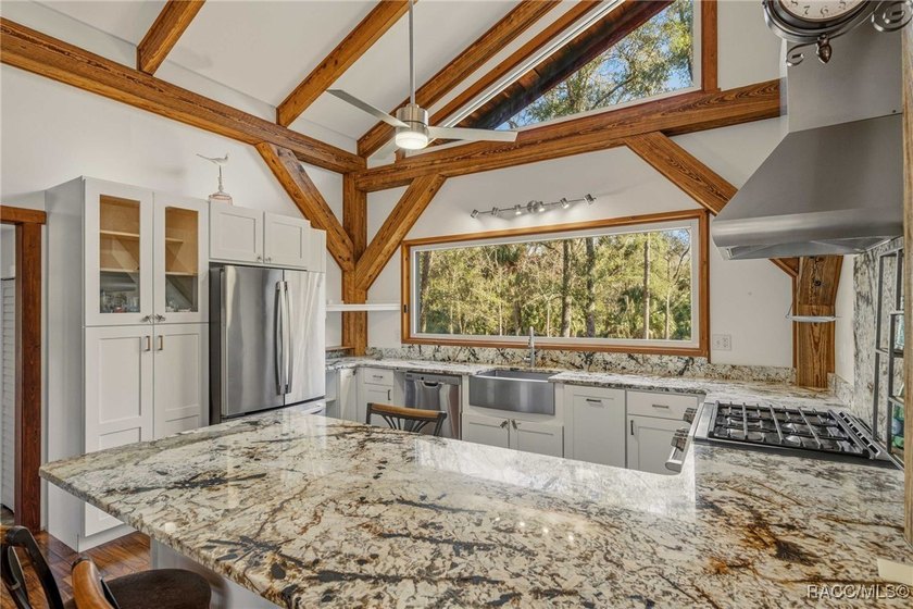 Architecturally distinctive cedar-sided post-and-beam home - photo 12