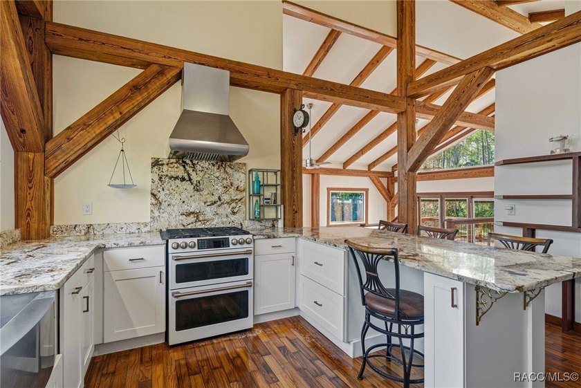 Architecturally distinctive cedar-sided post-and-beam home - photo 13