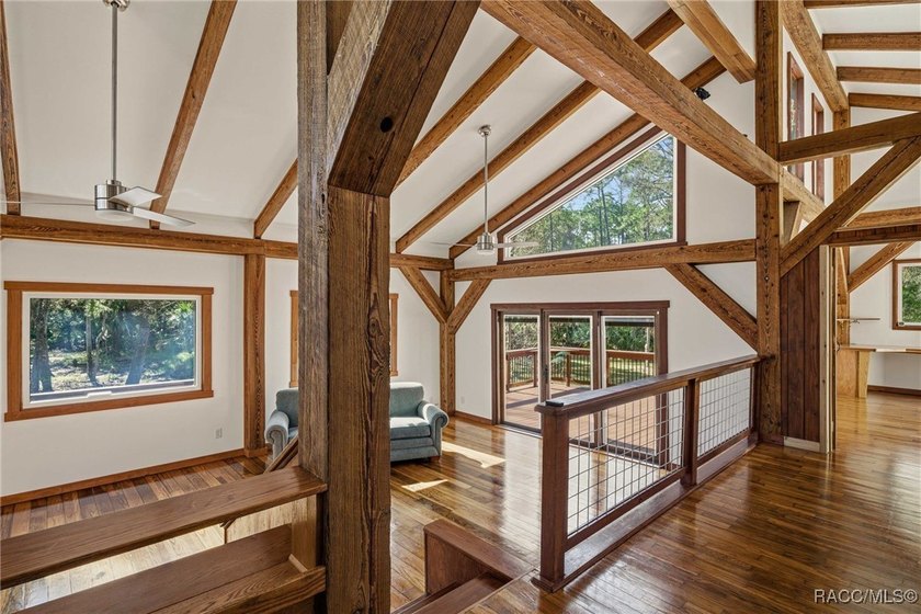 Architecturally distinctive cedar-sided post-and-beam home - photo 16