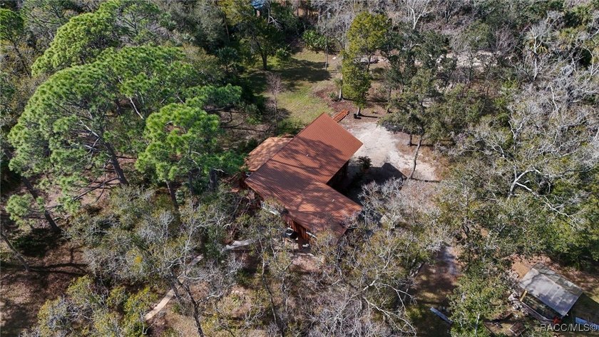 Architecturally distinctive cedar-sided post-and-beam home - photo 49
