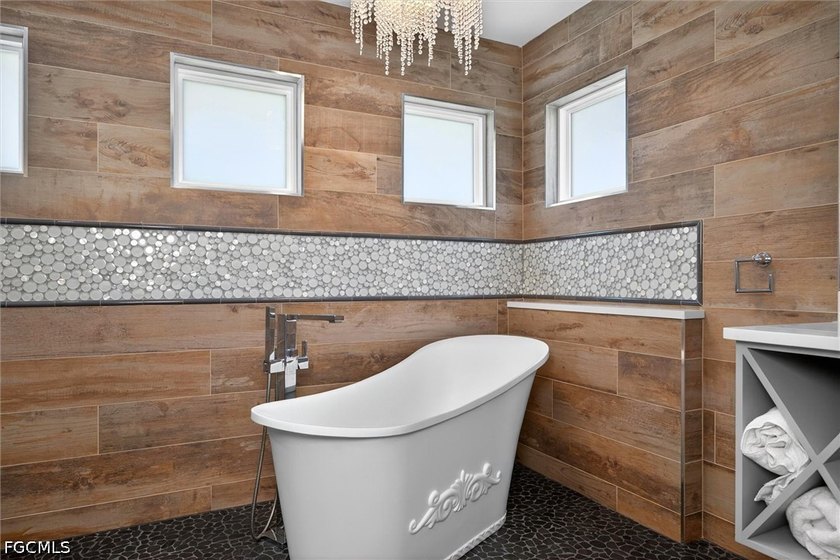 Welcome home to the highly sought-after gated community of - photo 22