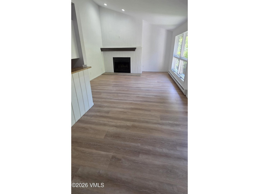 Excellent remodel! Move-in ready. This residence has had almost - photo 3