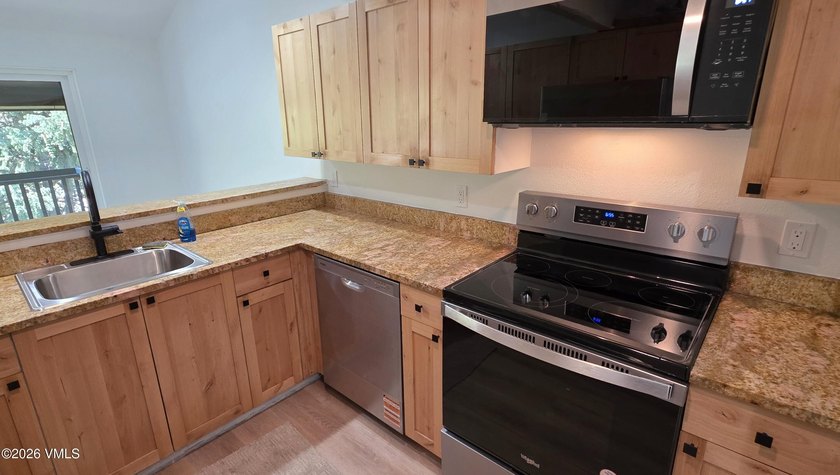 Excellent remodel! Move-in ready. This residence has had almost - photo 4