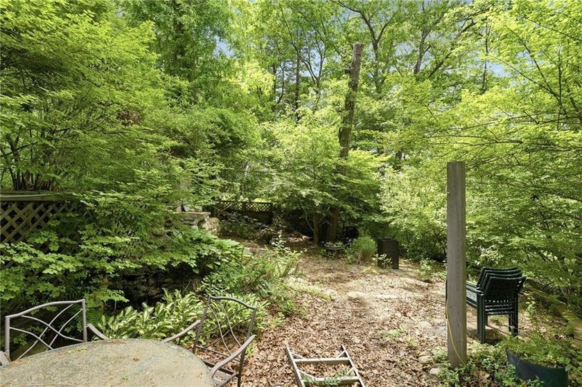 Set on nearly an acre in North Kingstown, this 3-bedroom, 1-bath - photo 9