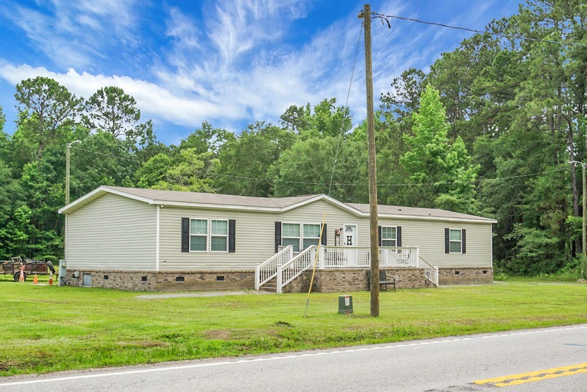 Welcome to this beautiful 4-bedroom, 2-bath home tucked away in - photo 2