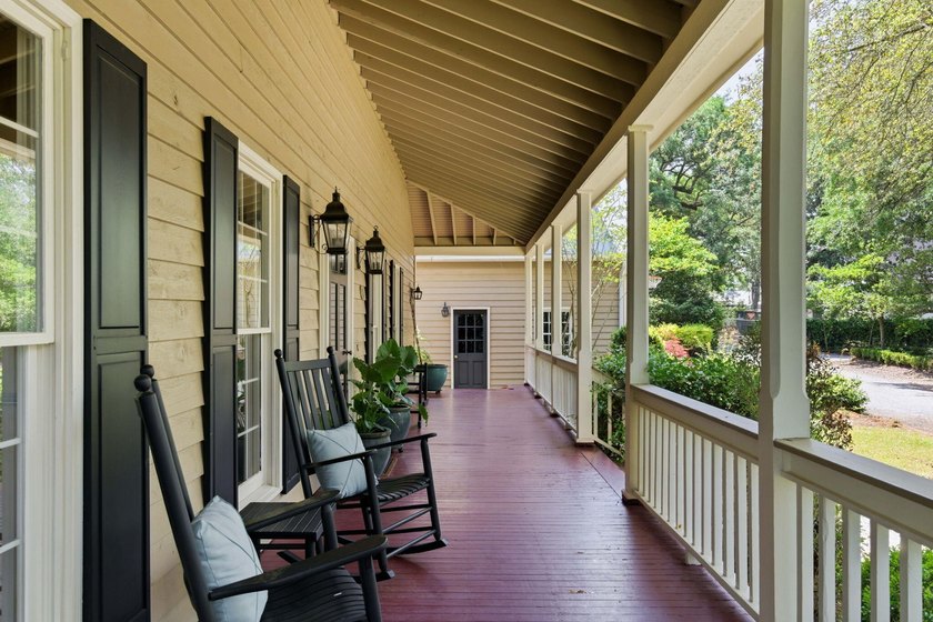 Located beneath breathtaking live oaks in the heart of the - photo 5