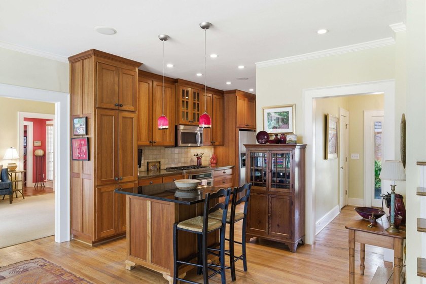Located beneath breathtaking live oaks in the heart of the - photo 8