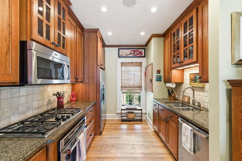 Located beneath breathtaking live oaks in the heart of the - photo 10