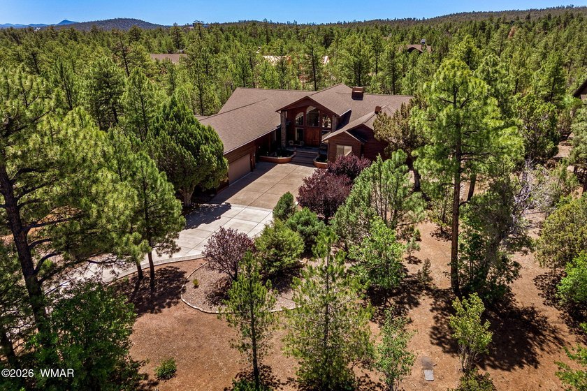 Tucked near the National Forest border of Torreon Golf Club on a - photo 40