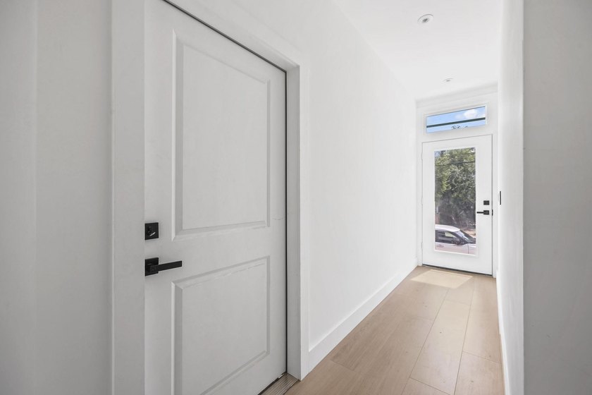 Exceptional condominium with a private fenced backyard and - photo 3