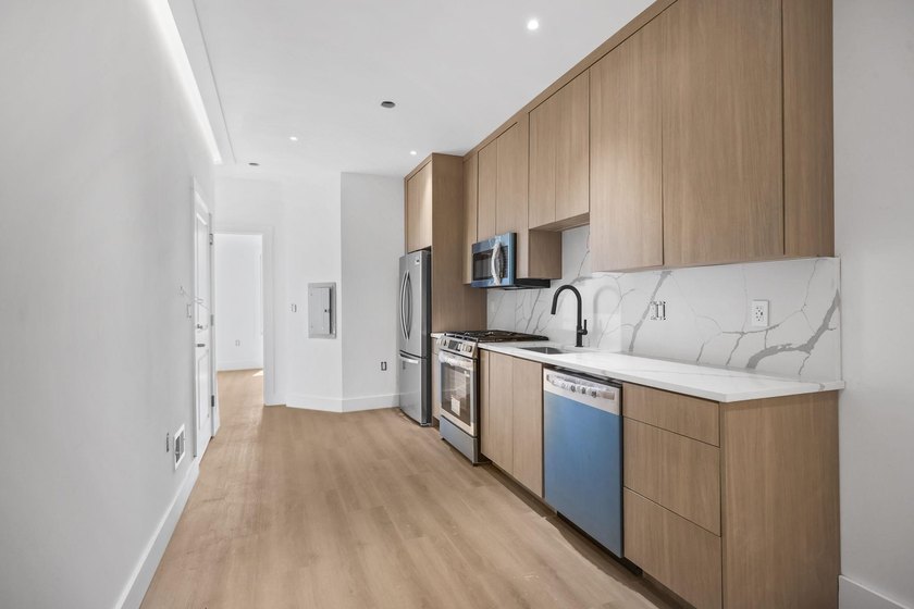 Exceptional condominium with a private fenced backyard and - photo 9