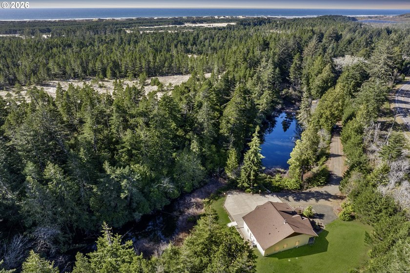 First time on the market, this custom-built retreat offers your - photo 3